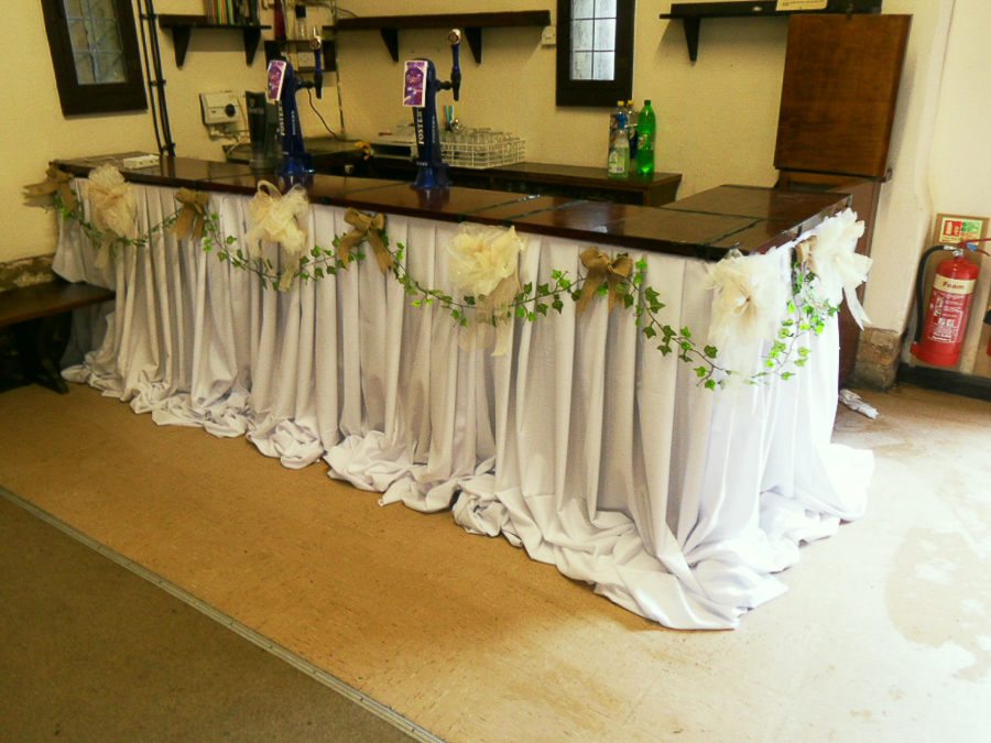 Hessian draping in a warm neutral palette